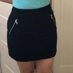 Black skirt with silver zippered side pockets